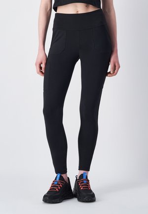 Schwarze Sportleggings mit hohem Bund und Fronttaschen, aus dehnbarem Material, glatter Textur, taillierter Silhouette.
