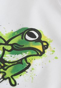 Unselected, white graffiti frog
