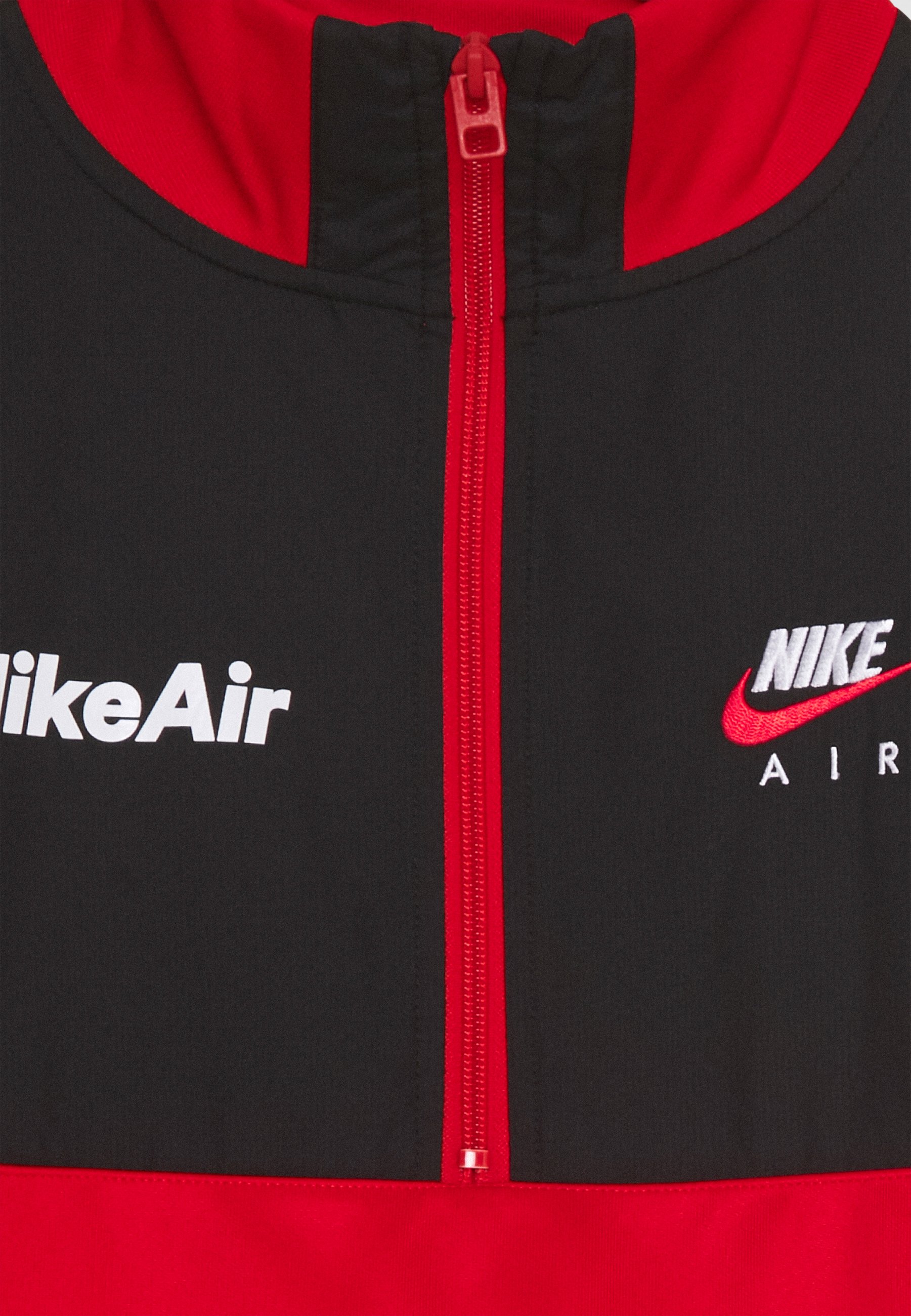 red black and white nike tracksuit