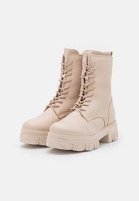 Marco Tozzi Lace-up ankle boots - cream