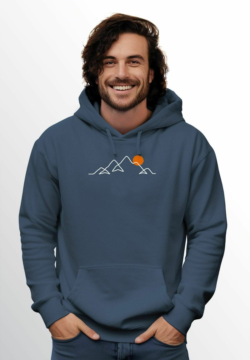 Navy blue hoodie featuring a graphic of mountains and a sun in white and orange. Made from soft fabric with a front pouch pocket.
