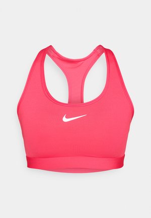 Sutien desportivo Nike em rosa brilhante com um design de costas nadador, textura suave e um logótipo branco centrado na frente.
