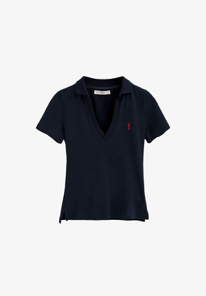 Navy blue polo shirt with a deep V-neck, short sleeves, side slits, and a small red logo on the left chest. Cotton material, smooth texture.