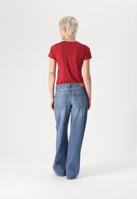 Gina Tricot LOW WIDE - Široke kavbojke - blue