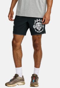 Black shorts with a tiger graphic and rose accents, featuring a drawstring waist and side pockets. Made from lightweight, stretchy fabric.