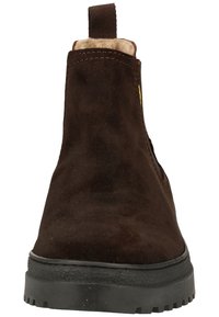 Braune Wildleder-Ankle-Boots mit runder Zehenform, Gummisohle und braunem Fleece-Futter. Mit einem Ziehhilfe an der Rückseite für einfaches An- und Ausziehen.