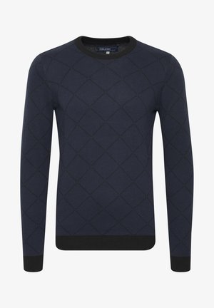 Tamsiai mėlynas megztinis su rombų raštu, apvaliu kaklu ir juodu apdailos kraštu ant rankovių ir apačios. Medžiaga atrodo minkšta ir tekstūruota.