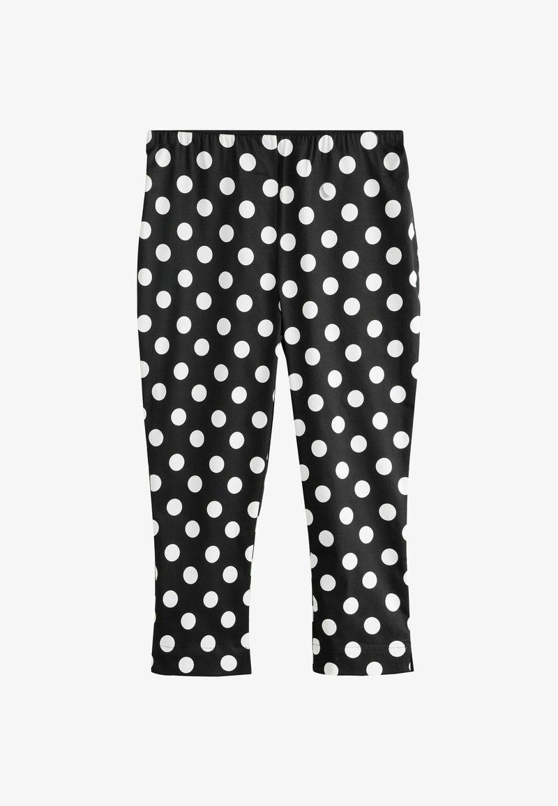Pantalon court noir à pois blancs, taille élastique et coupe droite.
