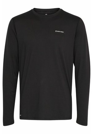 Camisa de manga larga negra hecha de tejido suave. Presenta un cuello redondo y un pequeño logo blanco en la parte superior izquierda.