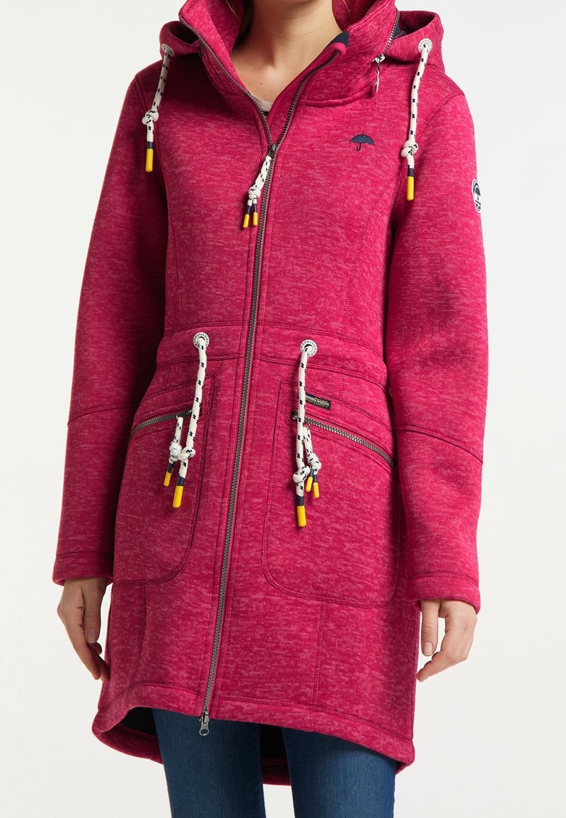 Pink zip-up coat with a hood, drawstrings featuring yellow accents, two front pockets, and a textured fabric design.