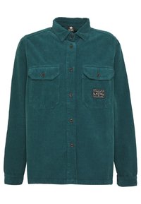 Teal kordflor skjorta med långa ärmar, två bröstfickor och ett vävt märke. Har en knapp-för-knapp fram och ribbad textur.