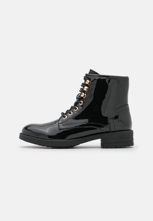 Bottines à lacets - black