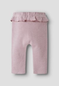 Jasnoróżowe legginsy o teksturowanym, prążkowanym wzorze. Posiadają falbaniaste wykończenie w pasie oraz skróconą długość. Gładki materiał z lekkim rozciągliwością.