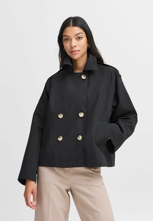 Black double-breasted jacket with gold buttons, featuring a high collar and spacious sleeves. Made from lightweight fabric.