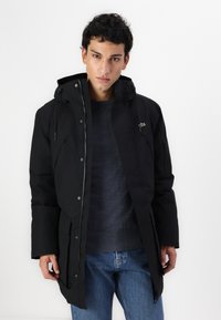Lacoste Ziemas mētelis - black