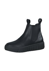 Bottines en cuir noir avec des panneaux élastiques sur les côtés, bout rond et semelle en caoutchouc texturé avec des rainures verticales.