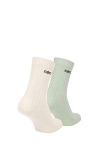 Prążkowane bawełniane skarpetki w kolorze off-white i jasnej zieleni, z zagiętym mankietem i haftowanym logo na kostce.