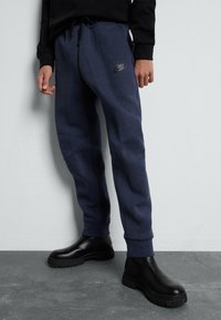 Nike Sportswear - TECH FLEECE PANT - Tracksuit bottoms - obsidian heather/dark blue Thumbnail Image 1