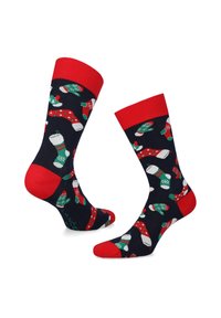 Granatowe skarpetki z kolorowymi, świątecznymi wzorami przedstawiającymi skarpety i rękawice na Boże Narodzenie, z czerwonymi mankietami i palcami.