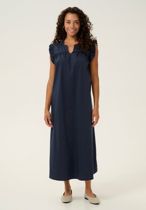 Navy blue, cotton dress with a relaxed fit, cap sleeves with ruffle details, a V-neckline, and a smooth, flowing fabric design.