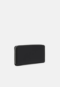 Calvin Klein Jeans SCULPTED ZIP AROUND MONO - Peňaženka - black