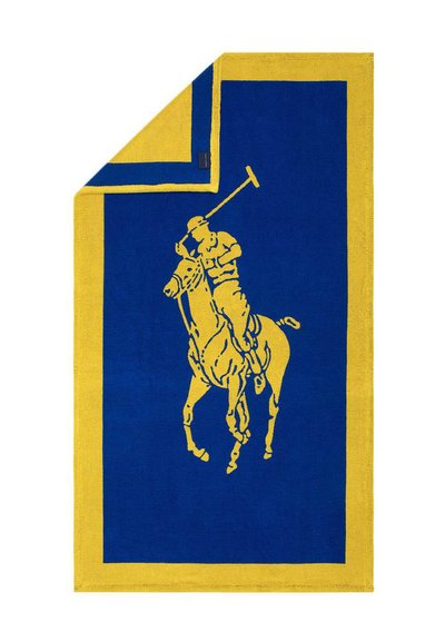 Μπλε και κίτρινη πετσέτα με κίτρινη σιλουέτα ενός παίκτη πόλο πάνω σε άλογο που κουνάει ένα ρόπαλο, περιβαλλόμενη από κίτρινο πλαίσιο.