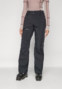 Black snow pants made of synthetic material, featuring a straight cut, two front pockets, and zippered details for added functionality.