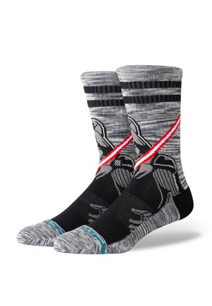 Black and gray patterned socks featuring a graphic design, striped cuff, and blue accent near the toe. Constructed for comfort and durability.