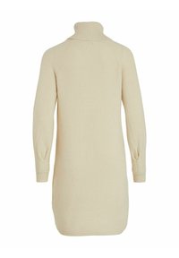 Abito maglione lavorato a maglia color crema con colletto alto, maniche lunghe e texture a coste, caratterizzato da una vestibilità morbida e leggere aperture laterali.