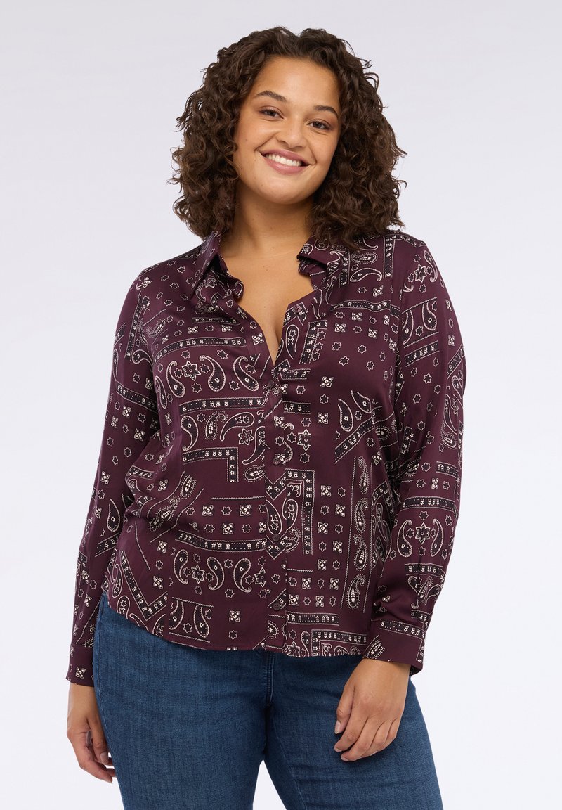 Camicia button-up bordeaux con motivo paisley, in tessuto morbido, maniche lunghe e una vestibilità rilassata. Presenta un colletto e bottoni frontali.