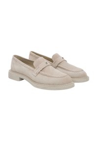 Beige suede loafers with a smooth finish, stitched detailing, and a low, chunky rubber sole. Features a decorative top strap with a metallic accent.