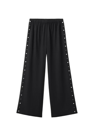 Pantalon noir à jambes larges avec une ceinture élastique et des boutons-pression argentés le long des côtés extérieurs de chaque jambe.
