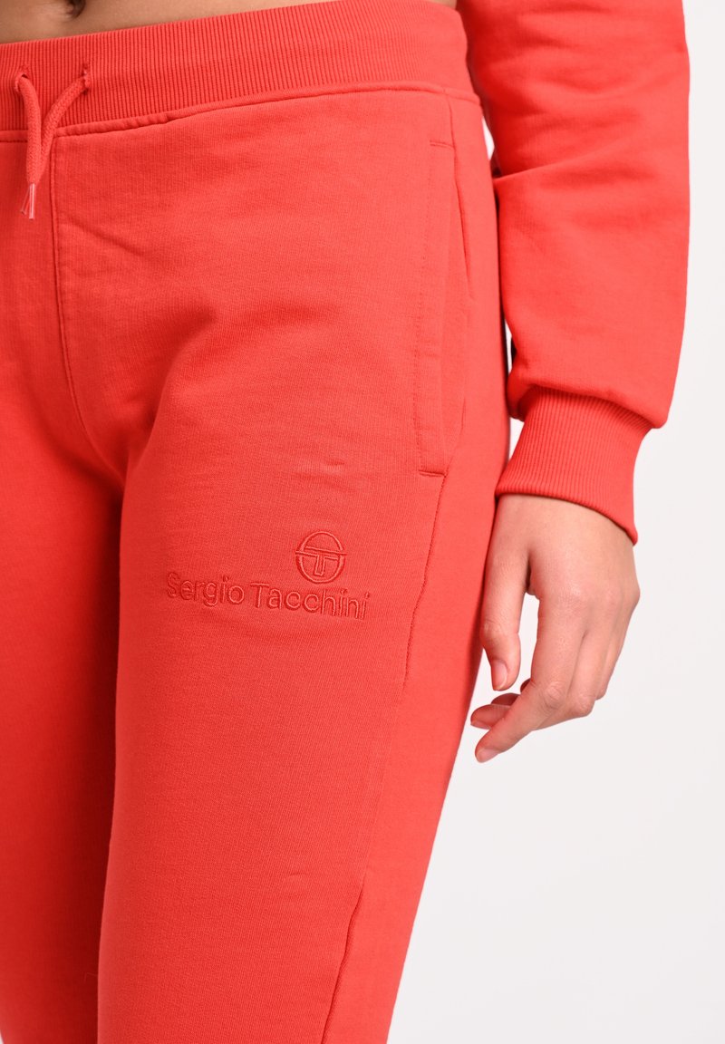 Damen Sportbekleidung | Sergio Tacchini AMANDAS Jogginghose molten lava/rot - LT19004 Damen Sportbekleidung | Sergio Tacchini AMANDAS Jogginghose molten lava/rot - LT19004