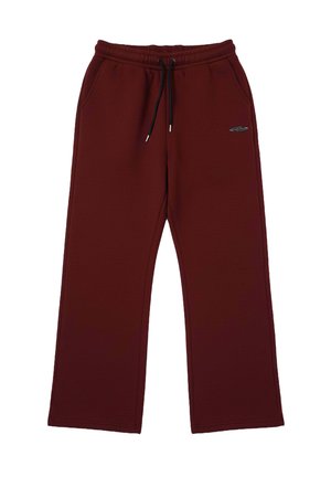 Bordeauxrode trainingsbroek van zacht materiaal, met een elastische tailleband met trekkoord en zijzakken, wijde pijpen en een logo-accent.