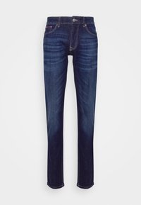 Mörkblå slim-fit jeans med fem fickor, knapplås och lätt blekning vid låren och knäna, uppställda mot en enkel vit bakgrund.