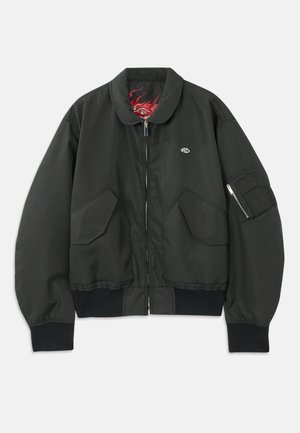 Black bomber jacket with a zip front, collar, and ribbed cuffs. Features two large front pockets and a sleeve pocket with zip closure.