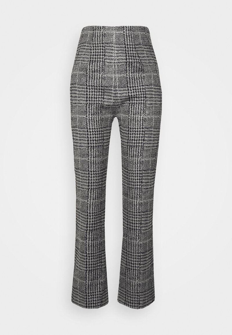 Pantalon gris à carreaux taille haute, cintré au niveau des cuisses avec des jambes légèrement évasées.