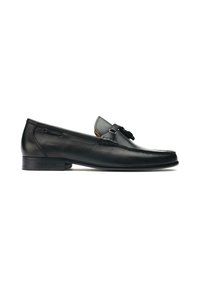 Black leather loafers featuring a decorative strap and tassel. The design has a smooth texture and a low, rounded heel.