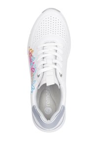 White sneaker with perforated design, colorful floral patterns on the side, white laces, and gray accents on heel and tongue.