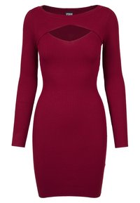 Abito bordeaux a coste con maniche lunghe, caratterizzato da un dettaglio a taglio sotto il colletto. Design aderente con una texture liscia.