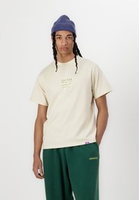 iets frans... HARRI WIDE LEG JOGGER UNISEX - Treniņtērpa apakšdaļas - green
