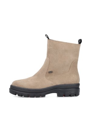 Light brown suede ankle boot with black thick rubber sole and pull tabs on front and back. Small brand label on side.