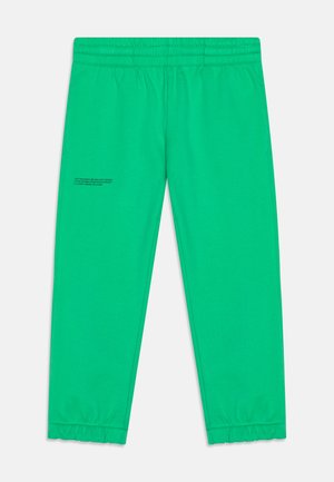 Green cotton sweatpants with an elastic waistband, side pockets, and gathered cuffs. Features printed text on one leg.