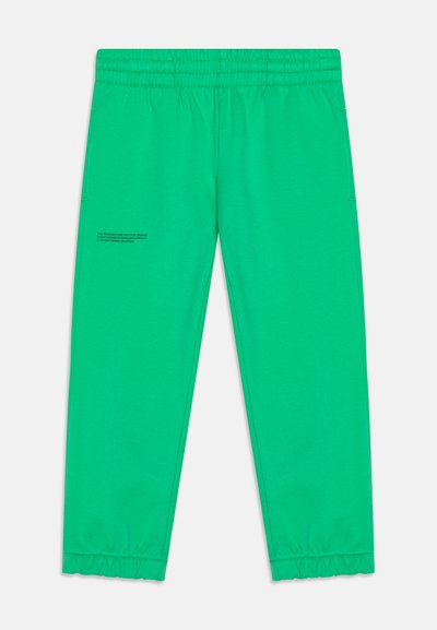 Calças de moletão verdes de algodão com cintura elástica, bolsos laterais e punhos franzidos. Apresenta texto impresso numa das pernas.