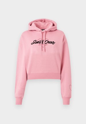 Rosa cropped hettegenser laget av mykt materiale, med et svart logo med hjerte-design, lange ermer og ribbestrikkede mansjetter.