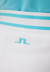 J.LINDEBERG Sports ISABEL SKIRT - Sportszoknya - white