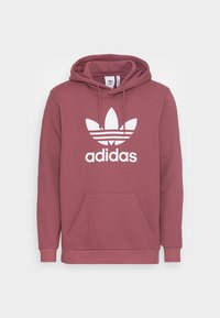 Mörkröd Adidas-huvtröja med känguruficka, vit logotyp med tre blad, justerbara dragskon och ribbade ärmslut och nederkant.