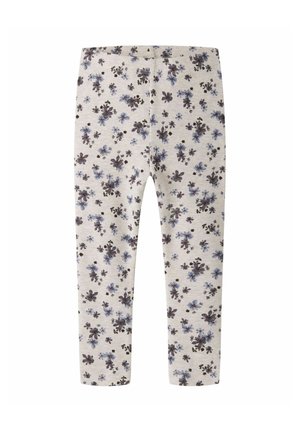 Leggings beige clair avec un petit motif floral violet foncé et bleu imprimé partout.