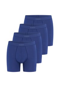 Blaue Baumwoll-Boxershorts mit einer konturierten Tasche und einem elastischen Bund mit "SLOGGI"-Markenlogo. Vier Paare nebeneinander angezeigt.