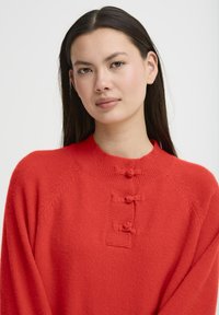 ICHI DASILA - Vesta - fiery red